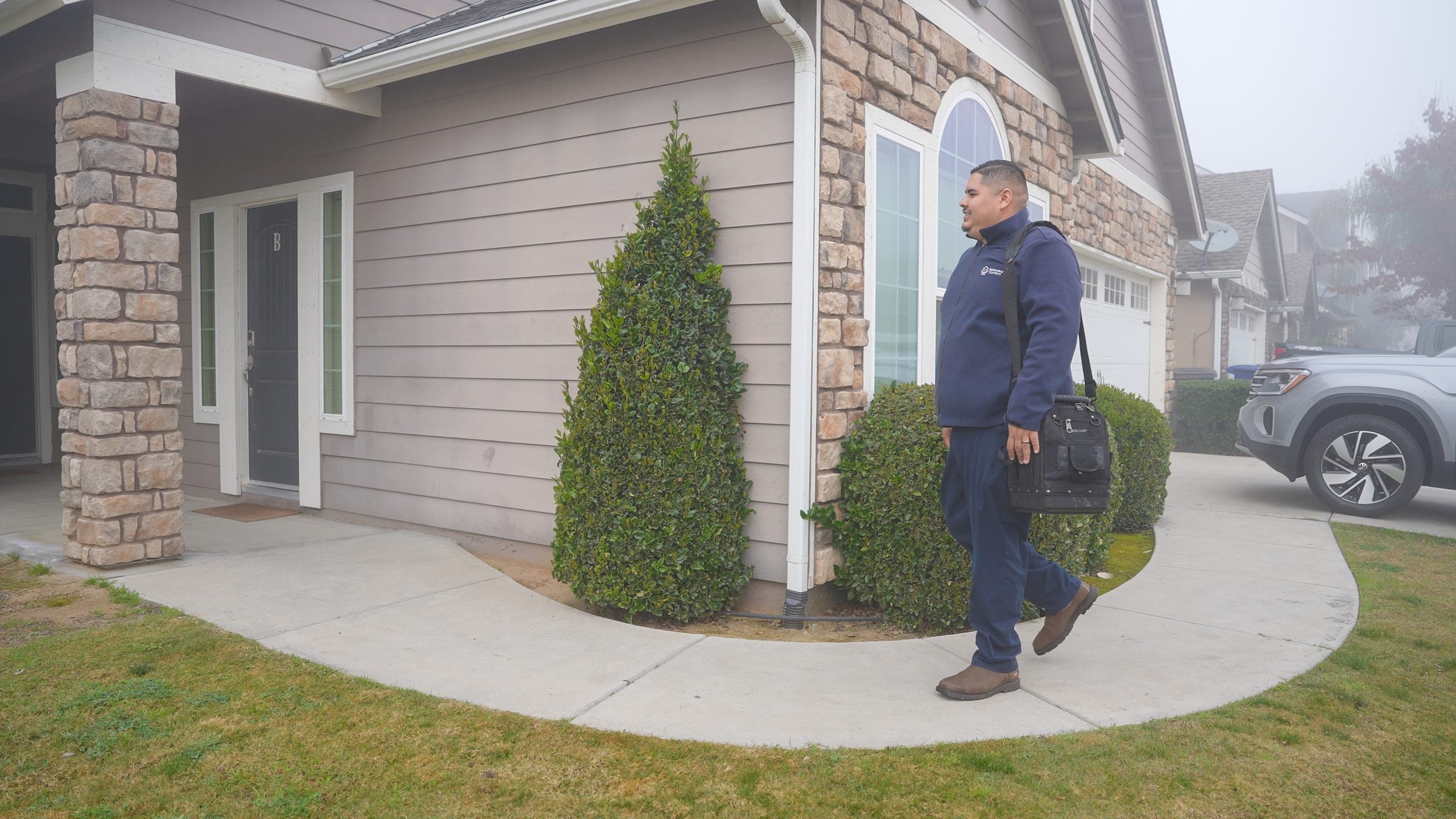 A friendly Balanced Comfort technician arriving at a Fresno home